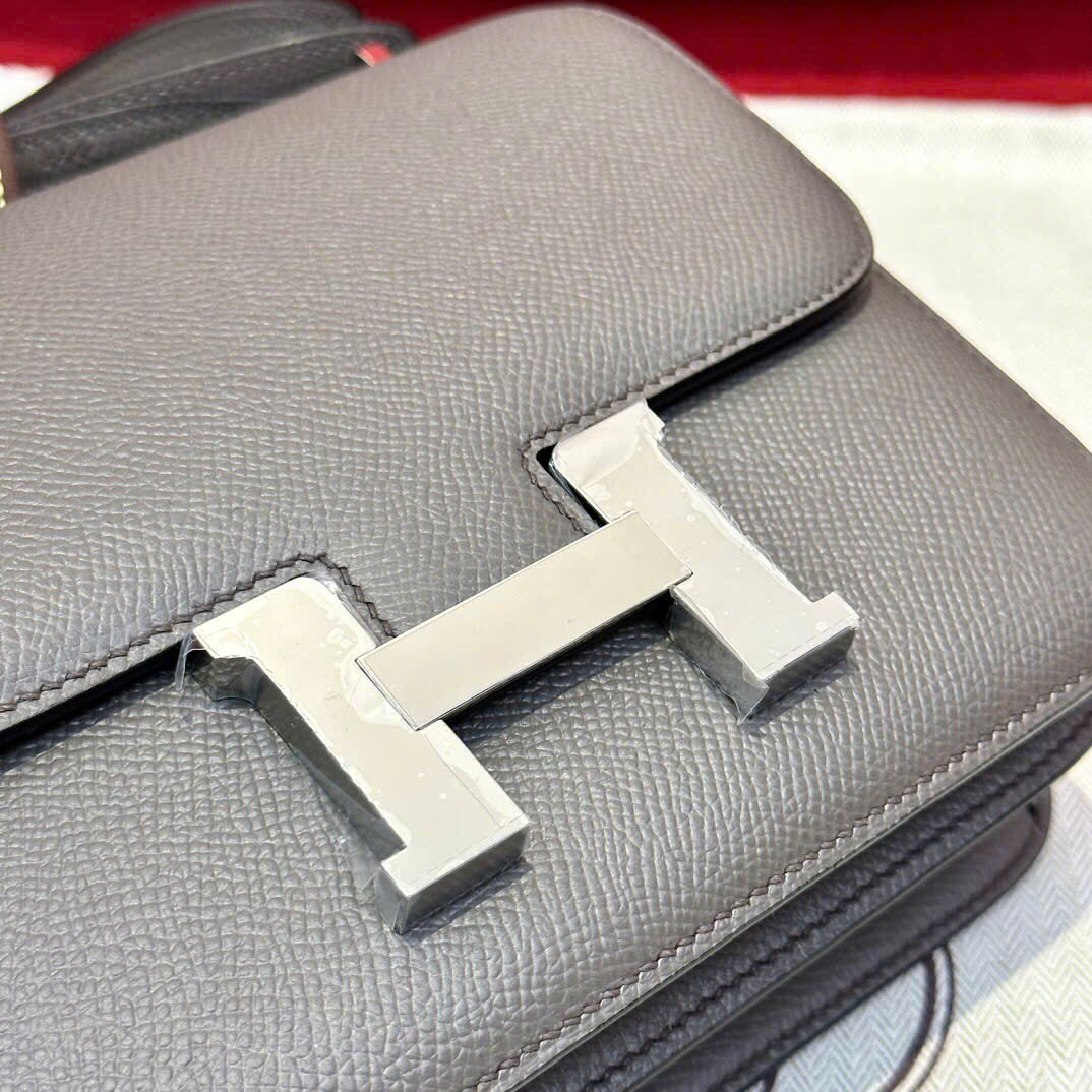 Túi xách Hermes Constance màu xám logo bạc 
