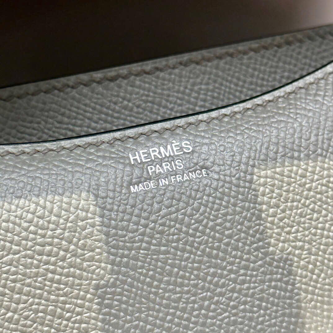 Túi xách Hermes Constance màu xám logo bạc 